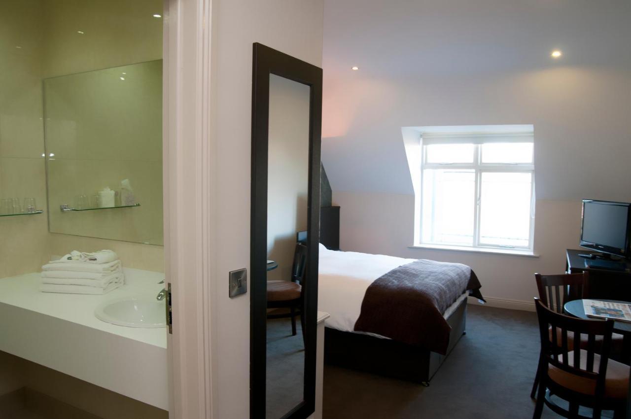 Dinn Ri Hotel Карлоу Номер фото